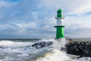 Mole on shore of the Baltic Sea during the storm Eunice in Warnemuende, Germany.